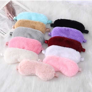 Flat lay of soft plush sleep masks in various colors with comfortable elastic bands
