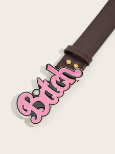 Detail of dark brown leather belt featuring a bold pink and black studded metal buckle