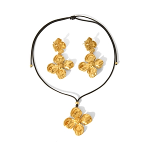 18K gold plated stainless steel floral jewelry set with earrings and black cord necklace