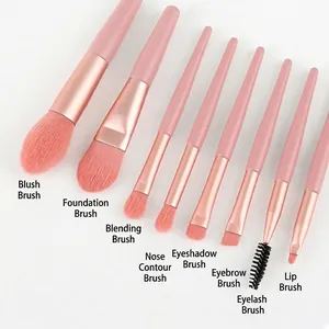 Set of 8 mini portable makeup brushes with pink wooden handles and soft synthetic bristles
