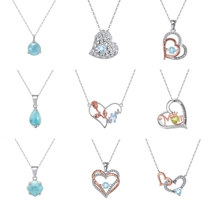 Collection of nine bohemian 925 silver necklaces with colorful natural stones for women