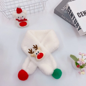 Detail of white plush scarf with Christmas reindeer plushie and colorful pom-poms
