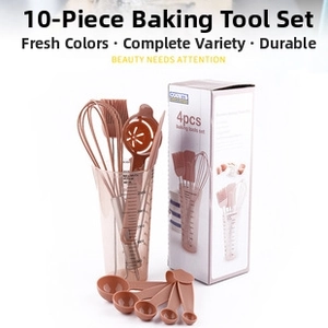 Close-up of a 10-piece silicone baking set including whisk and spatula in dusty rose