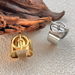 Minimalist 18K gold and silver wide band rings with T-toggle clasp and polished finish
