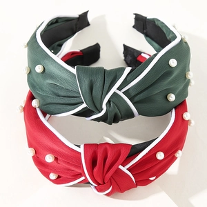 Cross-knot Christmas headbands with faux pearls in red and green silky fabric