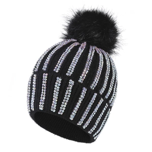 Women's black knit winter beanie with sparkling rhinestones and a fluffy pom-pom top