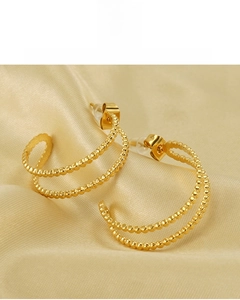 Detail of 18K gold vacuum plated C-shaped beaded earrings with lead and nickel free tag