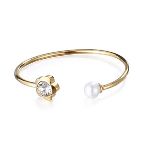 Elegant gold titanium steel open bangle with flower crystal and white pearl detail