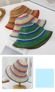 Detail of multi-colored striped straw hat showing hand-woven texture and foldable design
