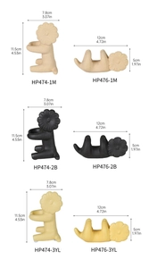Detailed size comparison of Nordic ceramic lion figurines in standing and lying poses