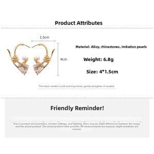 Detail view of heart drop earrings showing 4cm length and lightweight 6.8g alloy material