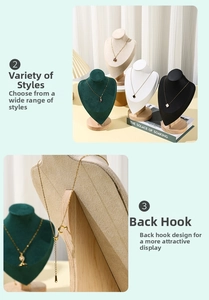 Detail view of solid wood base and adjustable metal hooks on jewelry display bust