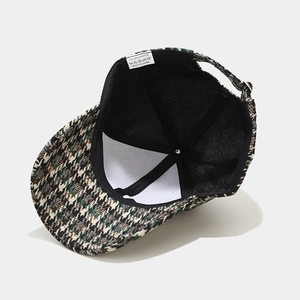Retro houndstooth baseball cap in green and brown with adjustable back strap