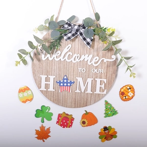 Round wooden welcome sign with interchangeable seasonal magnetic holiday ornaments