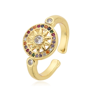 Adjustable gold ring with sunburst design, white zircon center and colorful gemstones