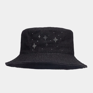 Detailed view of black denim bucket hat featuring star-shaped rhinestone embellishments