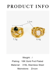 Detail view of 18K gold plated stainless steel heart ring with green zircon stones