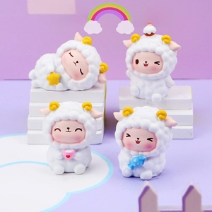 Detailed view of four cute resin sheep figurines in various poses on a white display stand