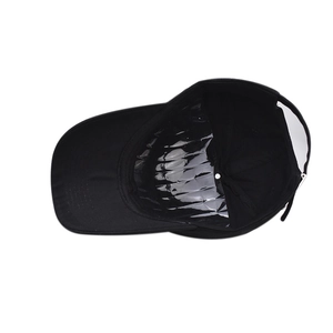 Detail view of cotton baseball cap interior structure and reinforced brim stitching