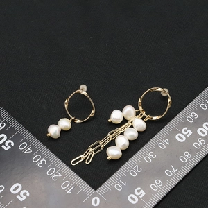 Asymmetric gold baroque pearl long tassel earrings with elegant vintage design