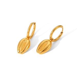 Golden hoop earrings with a detailed shell charm, featuring a polished metallic finish