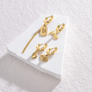Gold stainless steel punk earring set with heart, eye, and engraved square charms