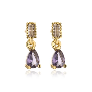Detail of 18K gold plated earrings with rectangle crystal and purple teardrop pendant