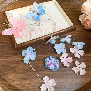 Elegant fabric butterfly hair clip with floral pearls and long tassel for women