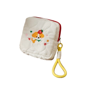 Trousse à maquillage matelassée blanche avec broderie de chiot et poignée jaune vive