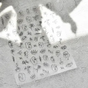 Abstract line art nail stickers with thin flexible material and modern face patterns