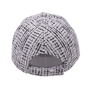 Detailed back view of a black and white woven tweed baseball cap for women fashion