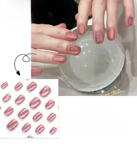 Detailed view of pink cat eye press on nails with elegant shimmering pearl finish