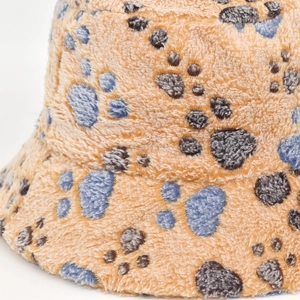 Winter plush bucket hat with bear paw patterns for women in beige and blue fleece