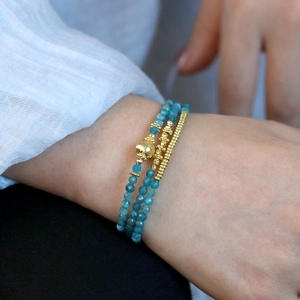 Three-layer sky blue stone beaded bracelet with elegant gold accents for women
