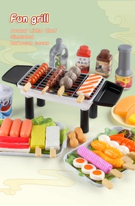 Detailed close-up of a kids toy barbecue set with realistic food skewers and white grill