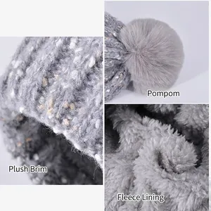 Winter thermal knit beanie hat with fluffy pompom and soft plush lining for warmth