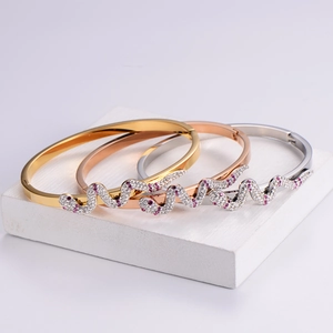 Serpentine 18K rose gold open bangles with sparkling zircon pavé in gold and silver