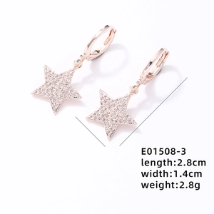 Macro view of rose gold star earrings with pave-set cubic zirconia and size details