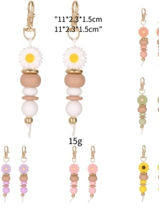 Detail showing various colors of beaded daisy keychains in silicone and metal
