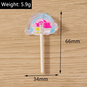 Rainbow cloud resin lollipop pendant charm showing 66mm height and 34mm width dimensions