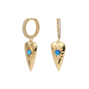 Detail of gold heart earrings featuring blue opal evil eye inlay and white zircon stones