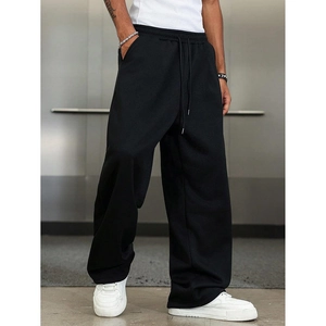 Men's retro black wide-leg joggers with a loose fit and urban streetwear design