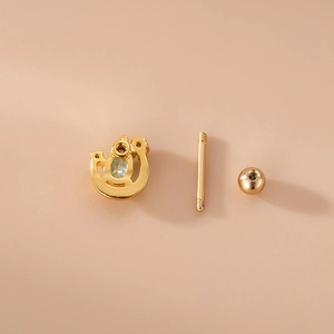 Gold stainless steel cartilage stud with blue crystal flower and screw-back ball closure