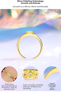 Detail of gold floral ring with yellow zircon stone and polished mirror finish