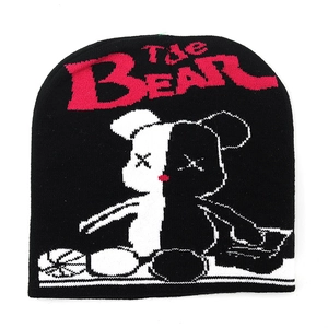 Gothic style knit beanie with pink THE BEAR text and black-white bear graphic