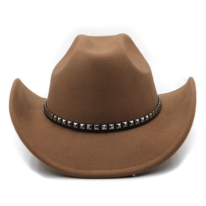 Detail of brown wool felt cowboy hat featuring a black studded band with silver rivets