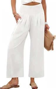 Détail du pantalon blanc à taille haute et jambes larges avec poches latérales d'été