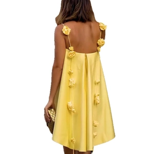 Bright yellow summer slip dress with 3D floral decoration and back tie detail