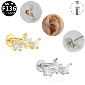 Detailed view of G23 titanium crown labret stud with internal thread and zircon stone