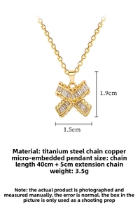 Macro detail of butterfly zircon pendant in gold finish with technical measurements